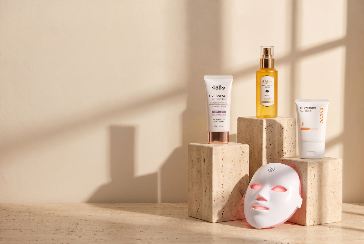 d'Alba UV Essence, d'Alba White Truffle serum, Lilyeve Grow:Turn ampoule and an LED face mask on travertine plinths